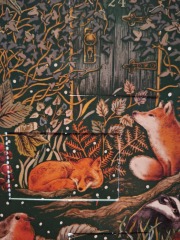 Picture advent calendars that add to the scene rather than have random pictures behind the doors