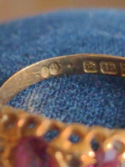 Help me identify hallmark on antique ring please