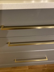 Brass handles and stainless steel tap?