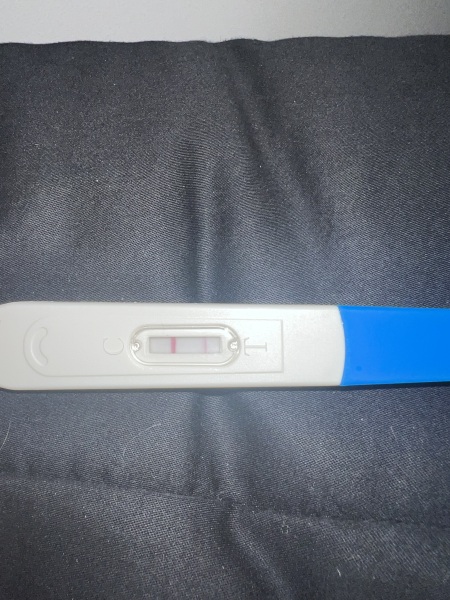 Line appeared outside the test window, am i pregnant? Pic attached