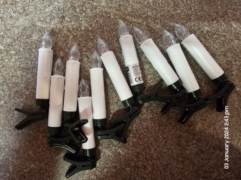 Does anyone have clip on candle lights for their tree, like these?