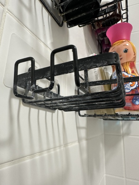 Limescale on Matt black shower caddy’s