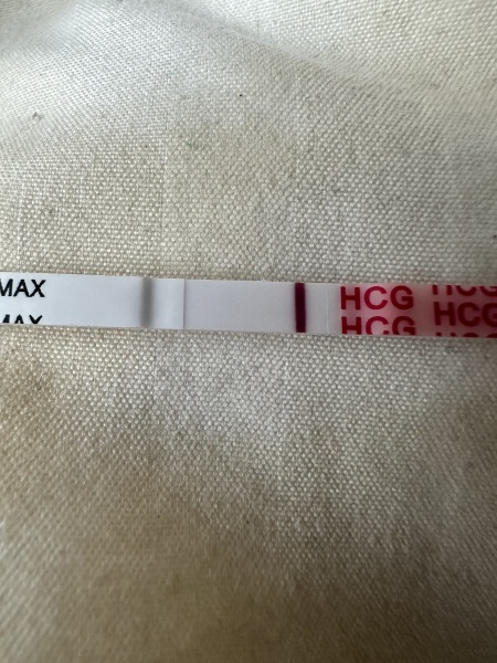 Very very faint positive or evaporation line