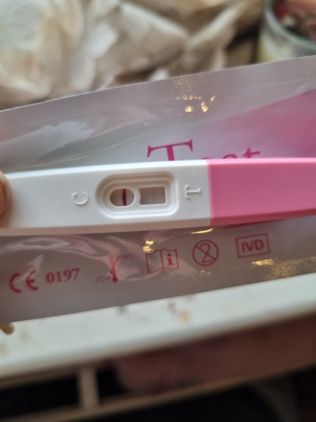 tested early, non-sensitive test, strong positive - twins??????