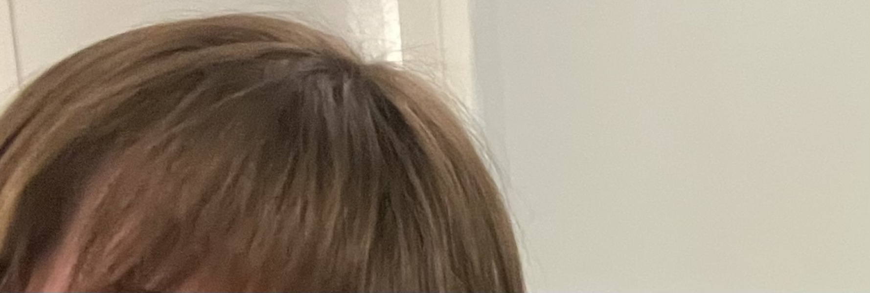 Originally brunette but now grey