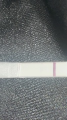 Very very faint positive or evaporation line