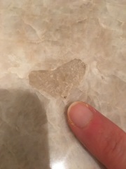 Filling holes in new stone worktop (pics)