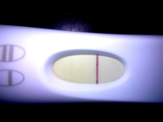 Faint positive or evaporation line?