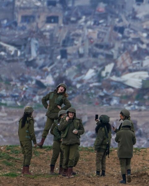 This picture of Israeli soldiers smiling for a selfie in front of a destroyed Gaza...