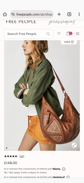 Large leather bag that says quality