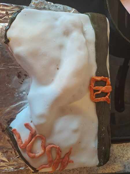 How can I make this 'Bulge Cake' look more realistic?