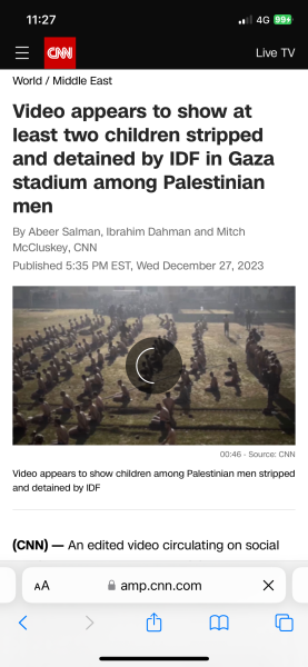 This picture of Israeli soldiers smiling for a selfie in front of a destroyed Gaza...