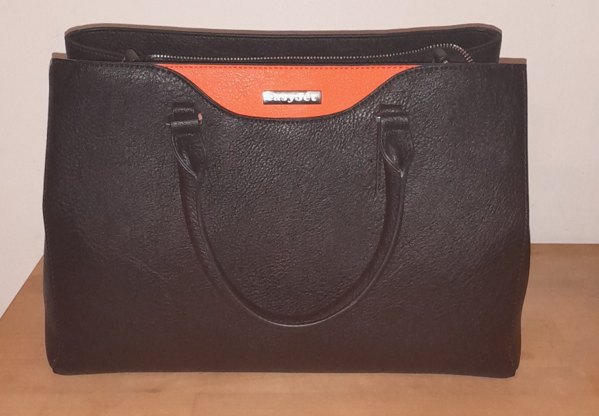 To show you how much I love my new bag??
