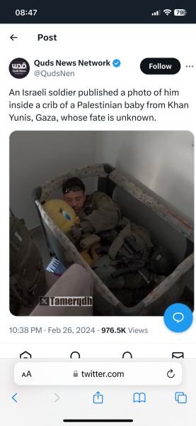 This picture of Israeli soldiers smiling for a selfie in front of a destroyed Gaza...