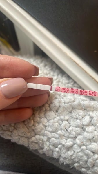 10/11dpo vvv faint positive?