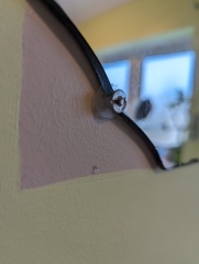 Help - how to get mirror off wall?