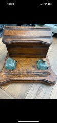 How old would you say this writing / letter rack is?