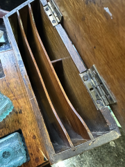 How old would you say this writing / letter rack is?