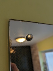 Help - how to get mirror off wall?