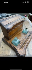 How old would you say this writing / letter rack is?