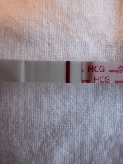 Faint pos/incomplete line - only 5dpo.
