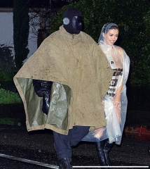 Does anyone have any opinion on why Kanye West keeps taking his wife out places naked?
