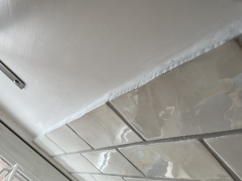 How to smooth out top of tiles? (don't want trim)