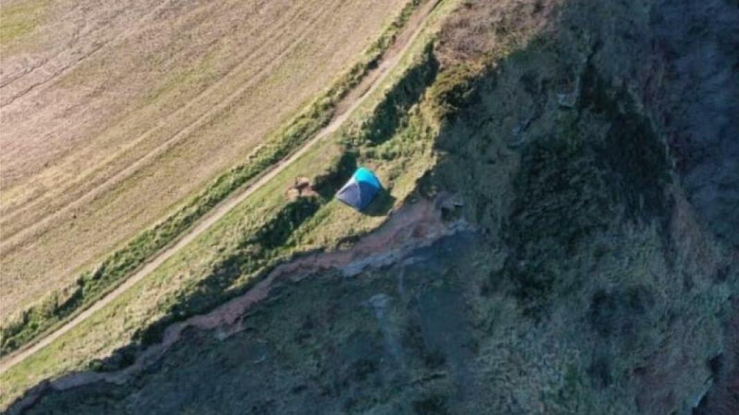 Toddler next to cliff edge