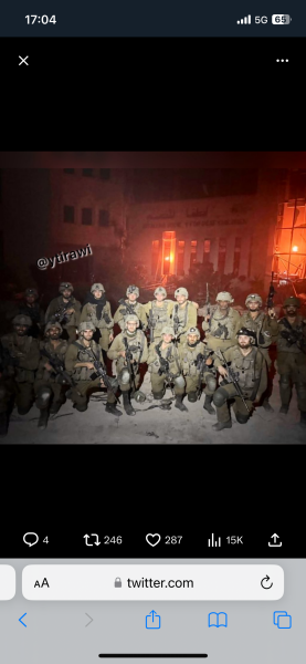 This picture of Israeli soldiers smiling for a selfie in front of a destroyed Gaza...