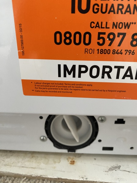 To ask what could be causing black stains/fuzz on clothes after washing machine cycle?