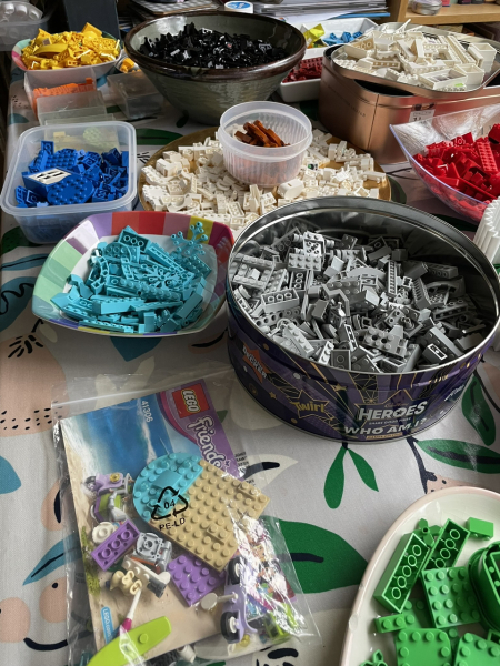 AIBU to sort mixed crate of Lego back into sets?