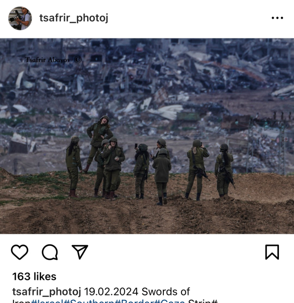 This picture of Israeli soldiers smiling for a selfie in front of a destroyed Gaza...