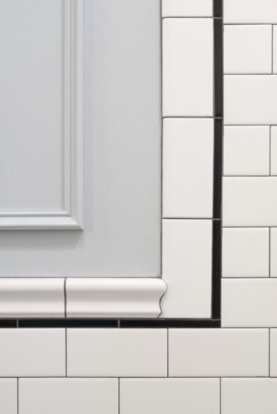 White metro tiles in a bathroom, what floor?