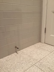 White metro tiles in a bathroom, what floor?
