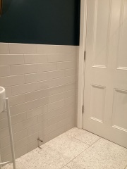 White metro tiles in a bathroom, what floor?