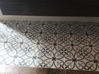 White metro tiles in a bathroom, what floor?