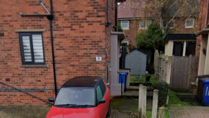 Front door at the side