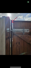 Leaning fence post just after driveway done
