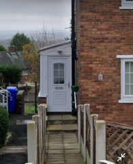 Front door at the side