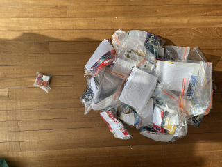 AIBU to sort mixed crate of Lego back into sets?