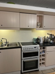 Pink kitchen cabinets