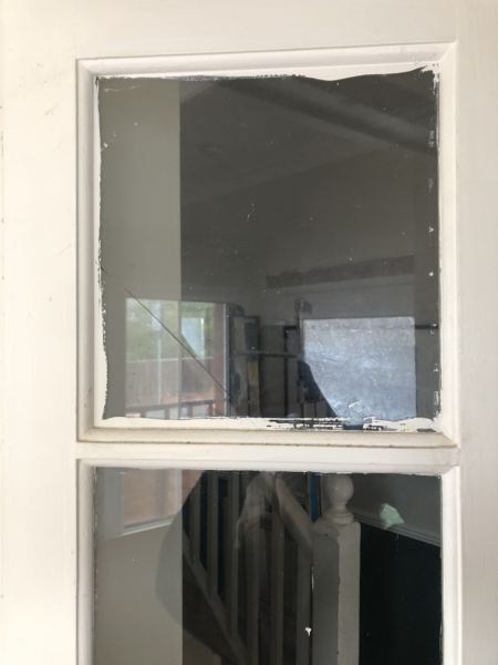 Crack in glass interior door.