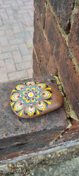 To be annoyed about her collecting the stones?