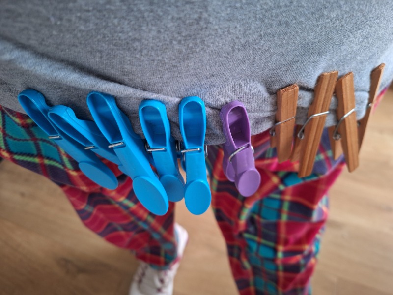 Putting washing on the line in the sun