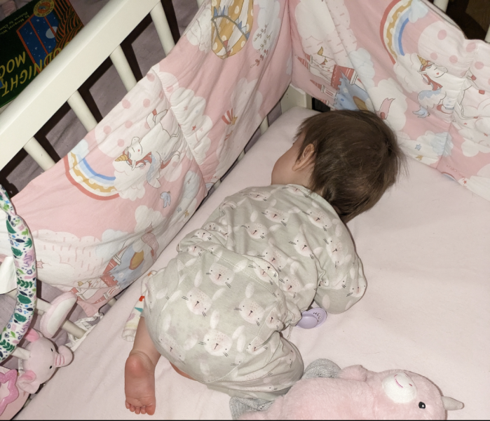 Should I let my 11 month old baby sleep in this position? (photo included)