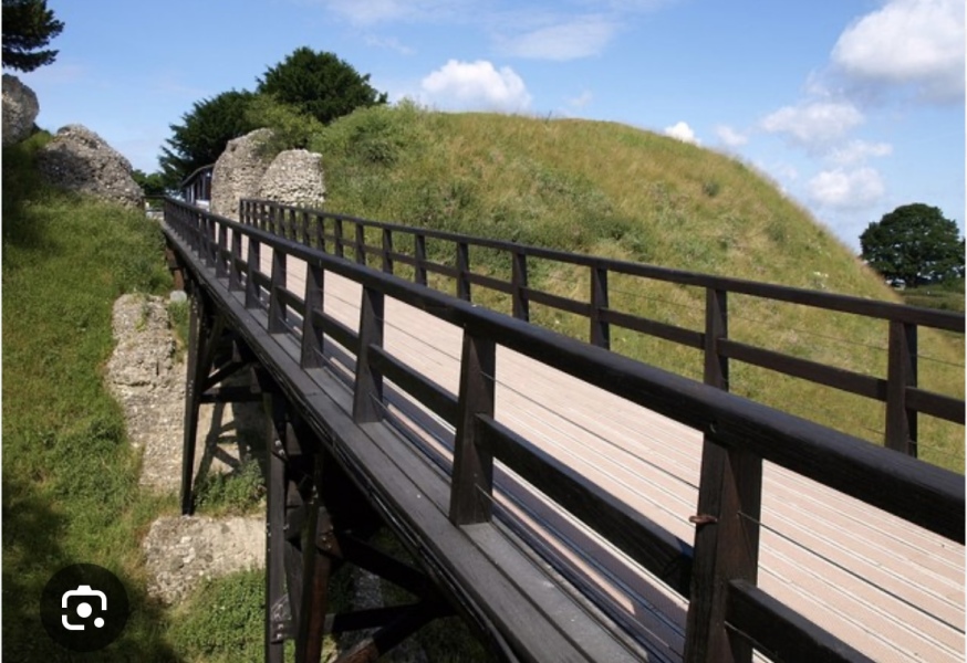 Sitting baby on edge of bridge