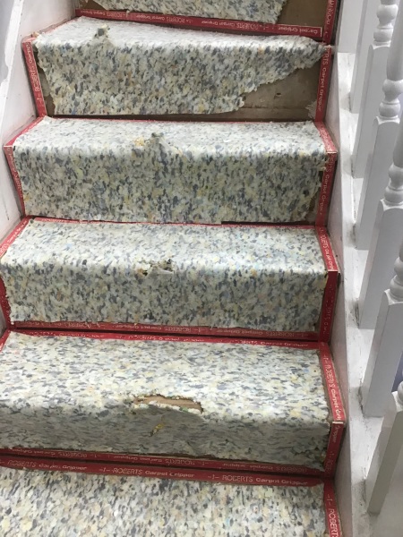 Housing Ass. Contractors didn’t finish job and comm. staircase is now lethal danger.