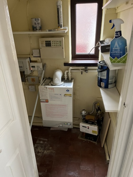 Toilet under stairs