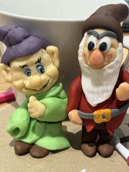 Please can you be honest. Making cake toppers for dd birthday, should I give up now (pics attached)