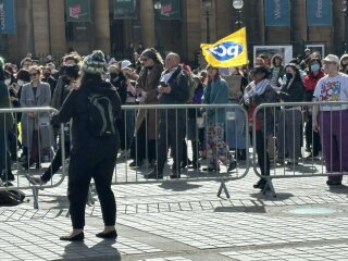PCS - civil service union - and Unite - protest against women's rights event in Edinburgh